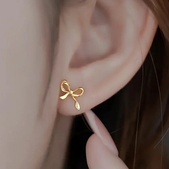Delicate Dainty Bow Gold Toned Stud Earrings - Picture 2 of 3